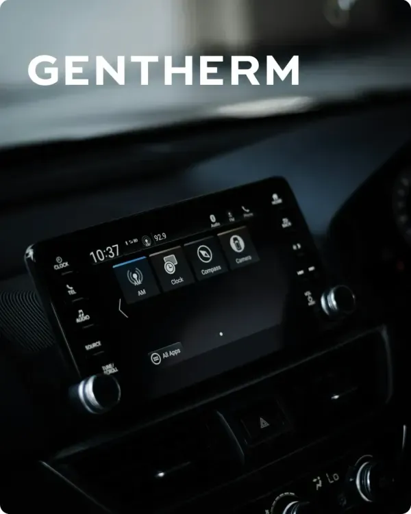Gentherm logo over a car dashboard touchscreen